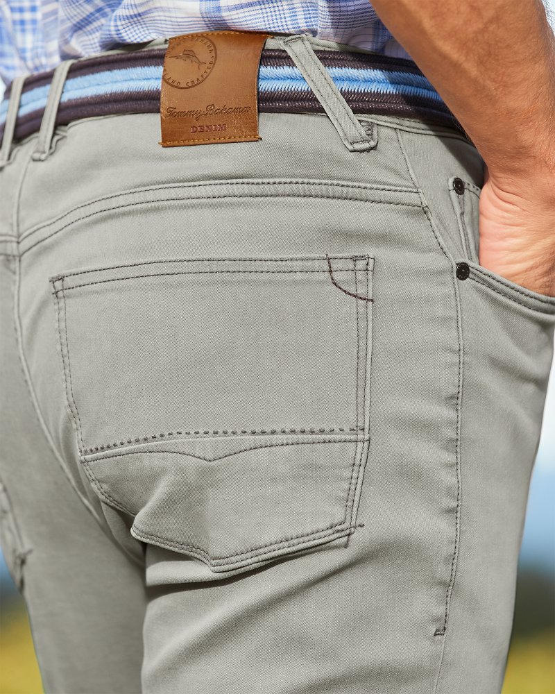 Please Shop Online Slim-fit regular-rise jeans with slant pockets